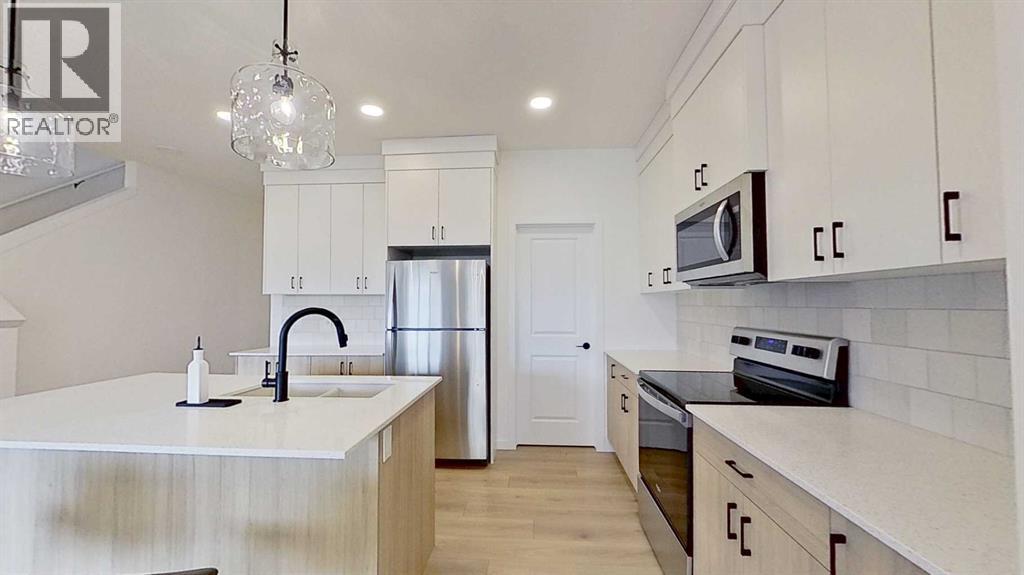 115 Fireside Street, Cochrane, Alberta  T4C 3J2 - Photo 5 - A2303910