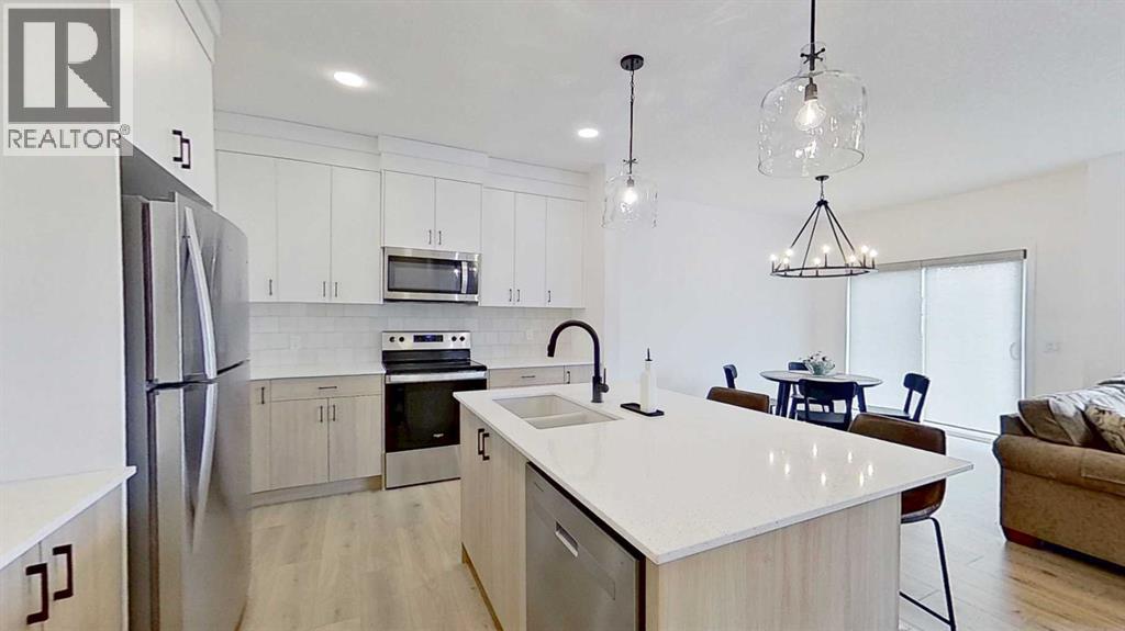 115 Fireside Street, Cochrane, Alberta  T4C 3J2 - Photo 3 - A2303910