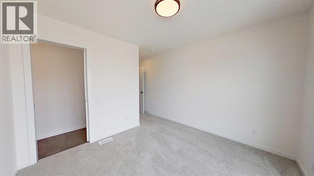 115 Fireside Street, Cochrane, Alberta  T4C 3J2 - Photo 25 - A2303910