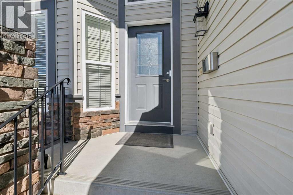 202 Tusslewood Terrace Nw, Calgary, Alberta  T3L 2W5 - Photo 3 - A2303756