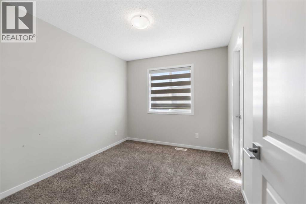 281 Creekside Boulevard Sw, Calgary, Alberta  T2X 4X9 - Photo 16 - A2304798