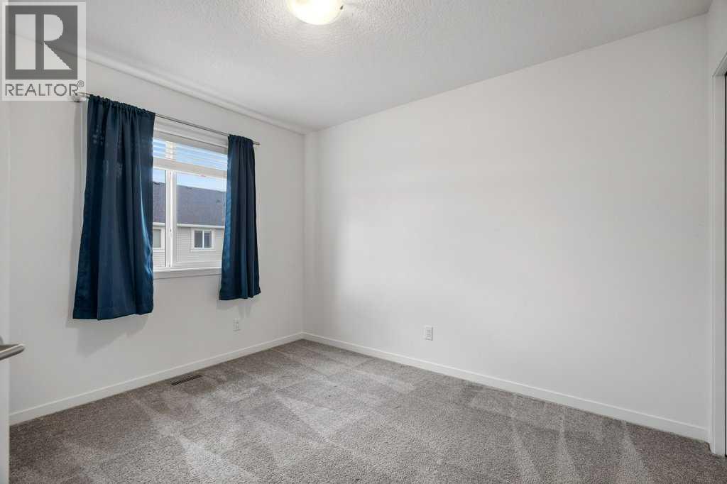 409 South Point Lane Sw, Airdrie, Alberta  T4B 5G8 - Photo 28 - A2304977