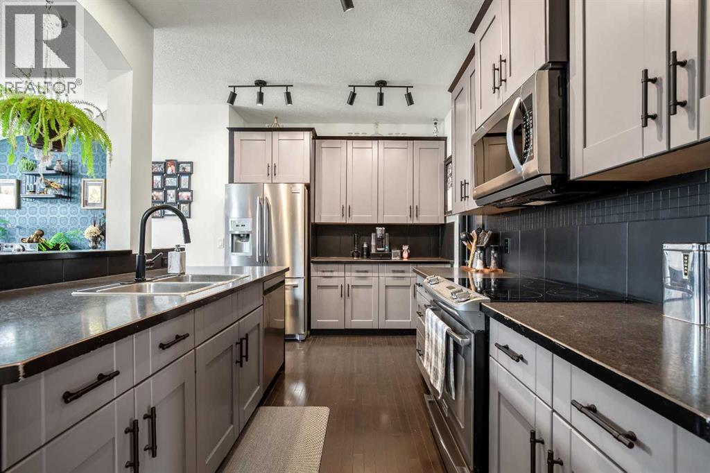 102 Cimarron Vista Crescent, Okotoks, Alberta  T1S 0K2 - Photo 9 - A2302943