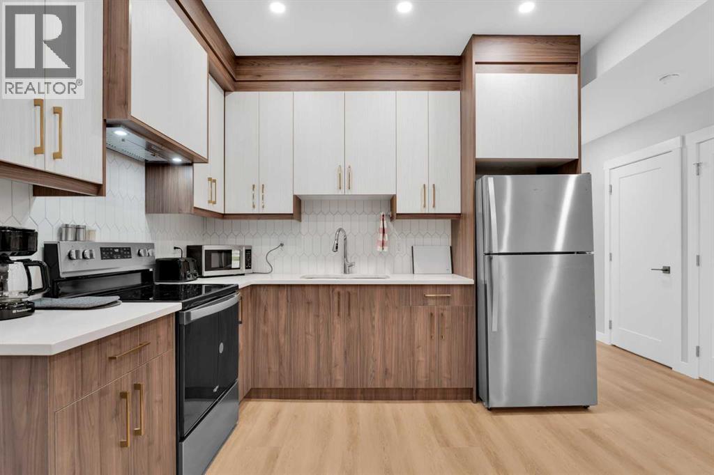 214 99 Avenue Se, Calgary, Alberta  T2J 0J1 - Photo 34 - A2303100