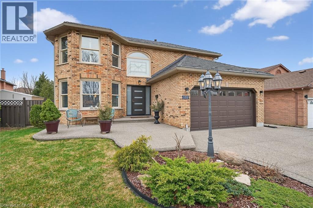 Outstanding home in a choice neighbourhood, set in a convenient location close to all amenities, parks, highway access, schools, and public transportation. This beautiful property begins with its attractive brick exterior, long-life metal roof, aggregate concrete driveway with parking for four cars, and extensive front and backyard landscaping. Access to the fully fenced backyard is available via walkways on both sides of the home, where you’ll find a quality above-ground pool with deck and durable off-season cover — perfect for outdoor enjoyment. This turn-key home features a spacious kitchen with Travertine tile flooring, granite countertops, upscale appliances, a stylish new backsplash, and updated kitchen faucet. Attractive wood flooring extends throughout the main and bedroom levels. Skylights in the kitchen with vaulted ceiling provide abundant natural light, while the curved staircase and balconies overlooking the entrance and kitchen add architectural appeal. The primary bedroom offers a beautiful ensuite bathroom, and the mostly finished basement features impressive high ceilings. Convenient main-level laundry includes a new washer and dryer. Recent improvements enhance both style and functionality, including a replaced front door, freshly painted interior throughout, updated light fixtures, ceiling fans in the primary bedroom, kitchen, and family room, replaced door handles and locks on all doors, new window shades in the living and dining rooms, updated powder room vanity, and painted garage door. Viewing the video provides an impressive introduction, but this remarkable home must be seen in person to be truly appreciated! (id:48254)
