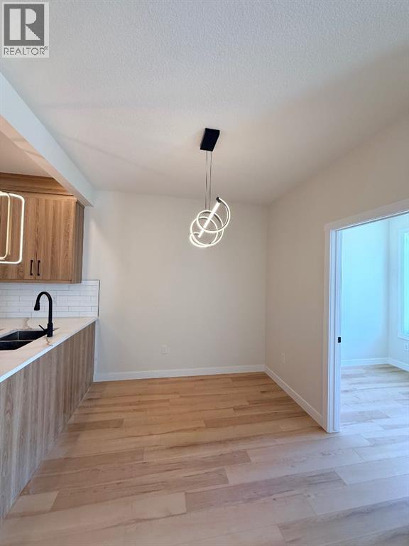 1997 Mccaskill Drive, Crossfield, Alberta  T0M 0C1 - Photo 8 - A2297284