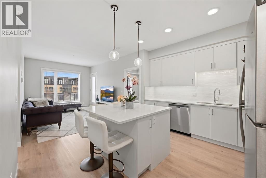 104, 660 Shawnee Square Sw, Calgary, Alberta  T2Y 2N6 - Photo 1 - A2302761