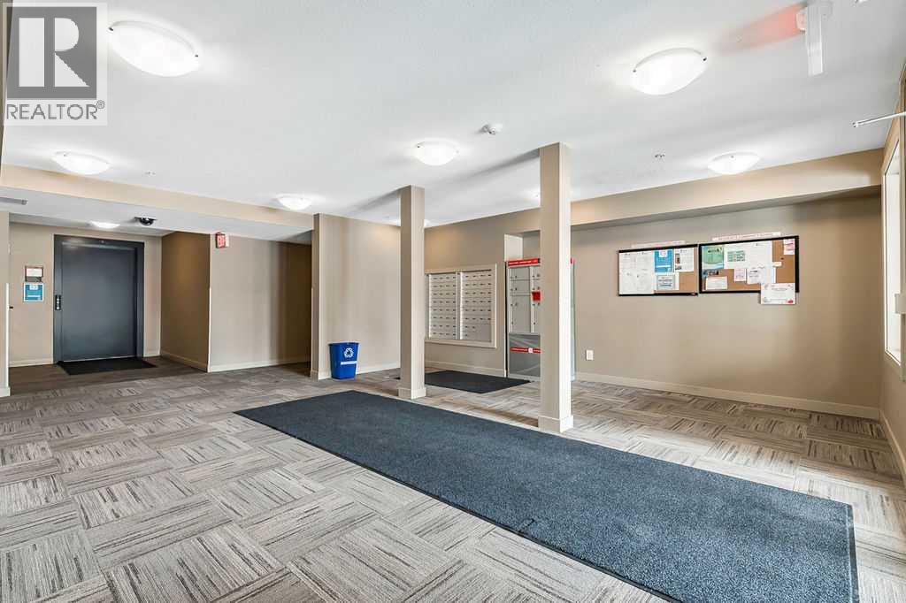 9410, 403 Mackenzie Way Sw, Airdrie, Alberta  T4B 3V7 - Photo 5 - A2300726