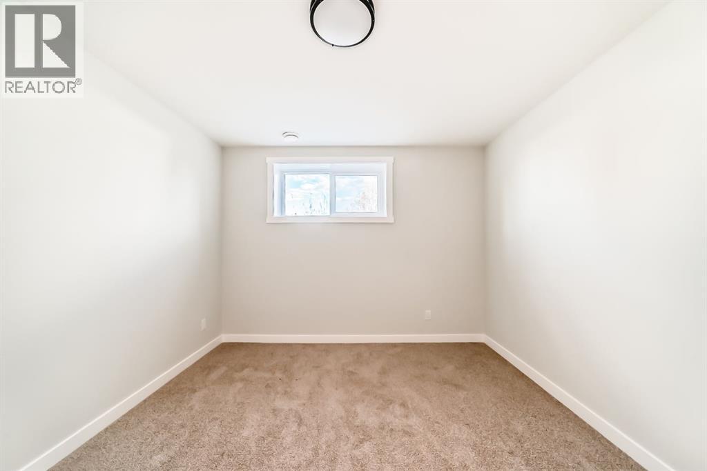 1103 Clover Close, Carstairs, Alberta  T0M 0N0 - Photo 32 - A2305133