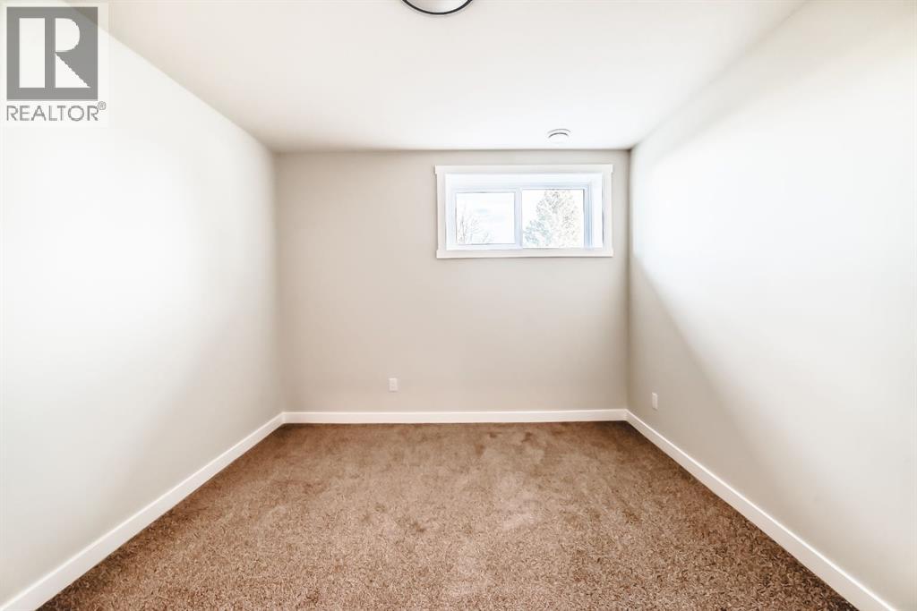 1103 Clover Close, Carstairs, Alberta  T0M 0N0 - Photo 34 - A2305133