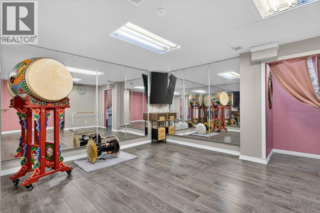 1012 Windsong Drive Sw, Airdrie, Alberta  T4B 0P2 - Photo 43 - A2293220