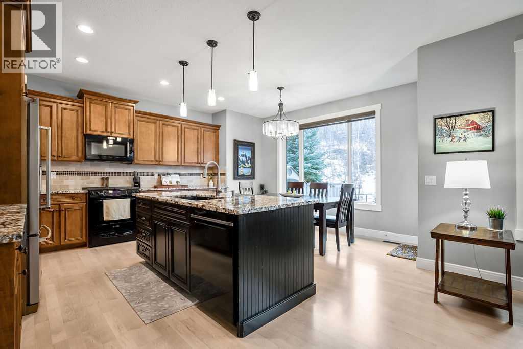 180 Sheep River Cove, Okotoks, Alberta  T1S 2L5 - Photo 6 - A2304298