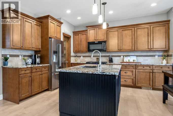 180 Sheep River Cove, Okotoks, Alberta  T1S 2L5 - Photo 4 - A2304298