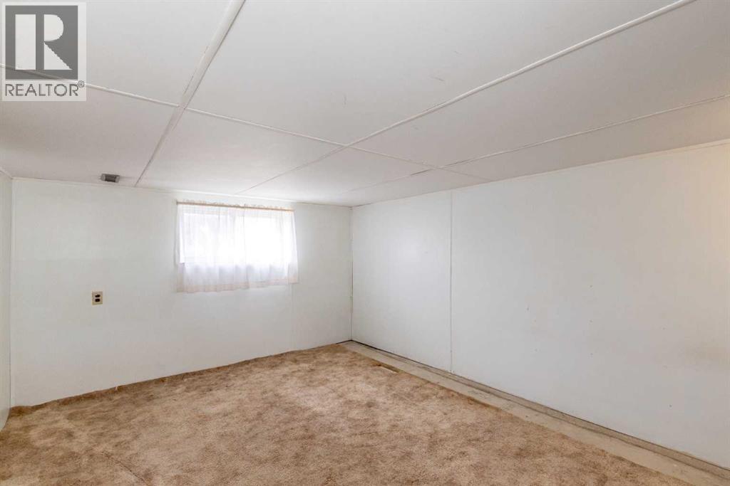 4108 49a Avenue, Innisfail, Alberta  T4G 1J9 - Photo 44 - A2301778