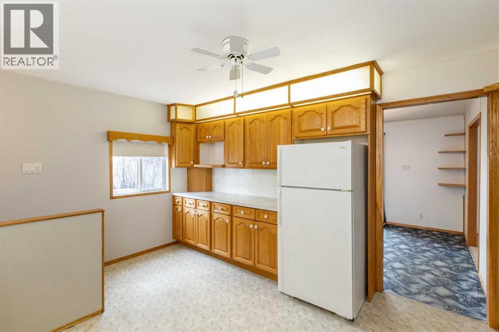 4108 49a Avenue, Innisfail, Alberta  T4G 1J9 - Photo 8 - A2301778