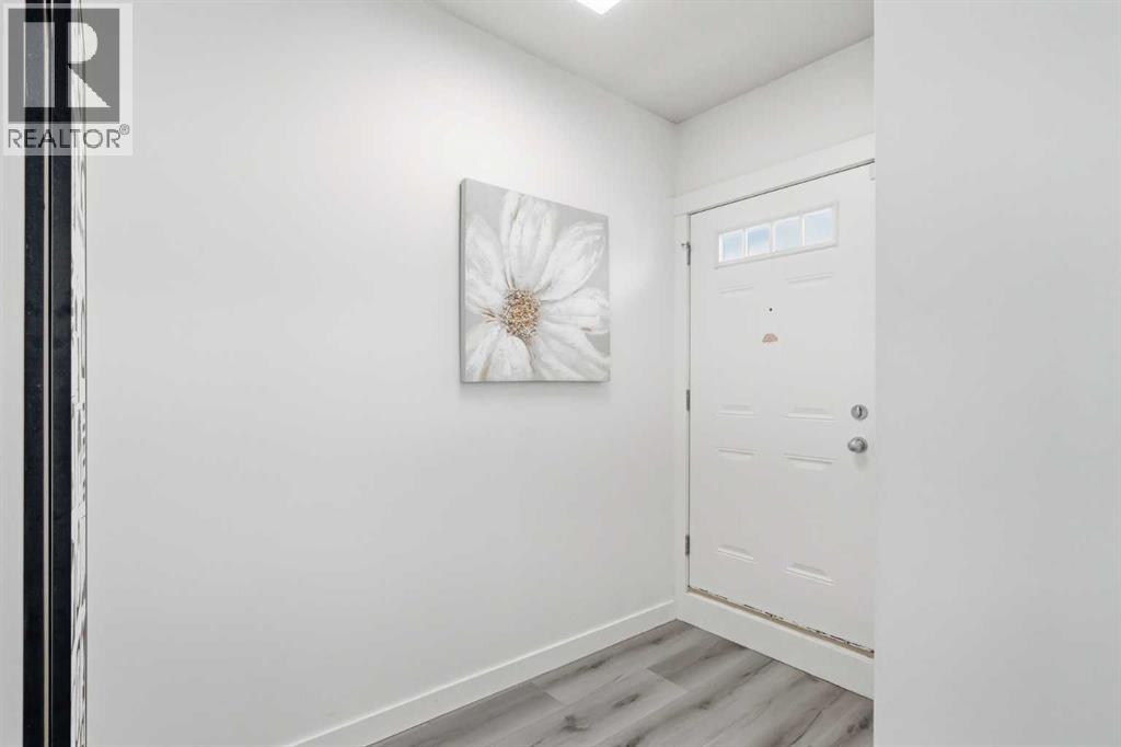 744 73 Street SW, Calgary, Alberta  T3H 5V9 - Photo 5 - A2305016