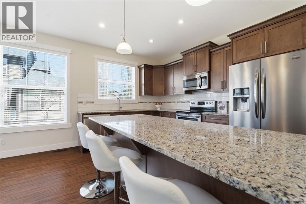 403, 110 Coopers Common SW, Airdrie, Alberta  T4B 3Y3 - Photo 5 - A2303776