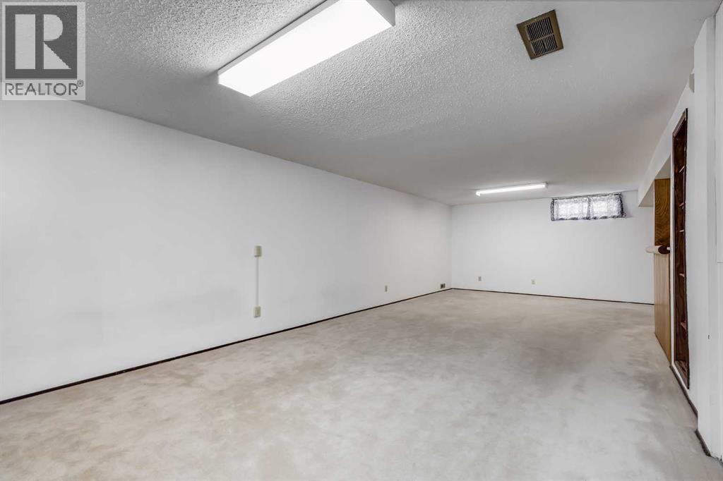 248 Huntcroft Road Ne, Calgary, Alberta  T2K 4E2 - Photo 25 - A2304860