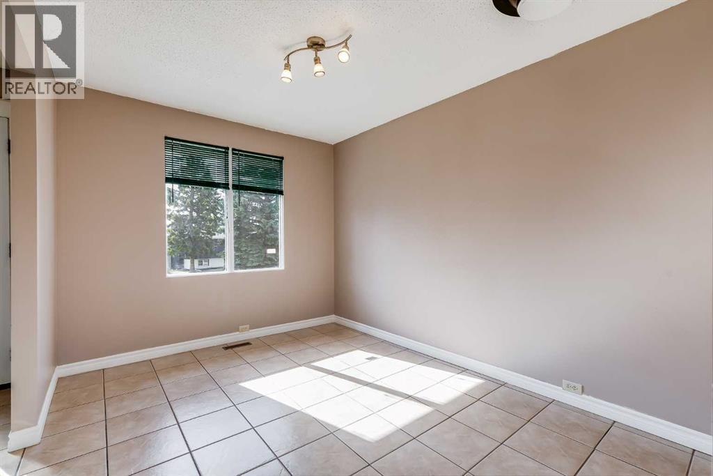 248 Huntcroft Road Ne, Calgary, Alberta  T2K 4E2 - Photo 10 - A2304860