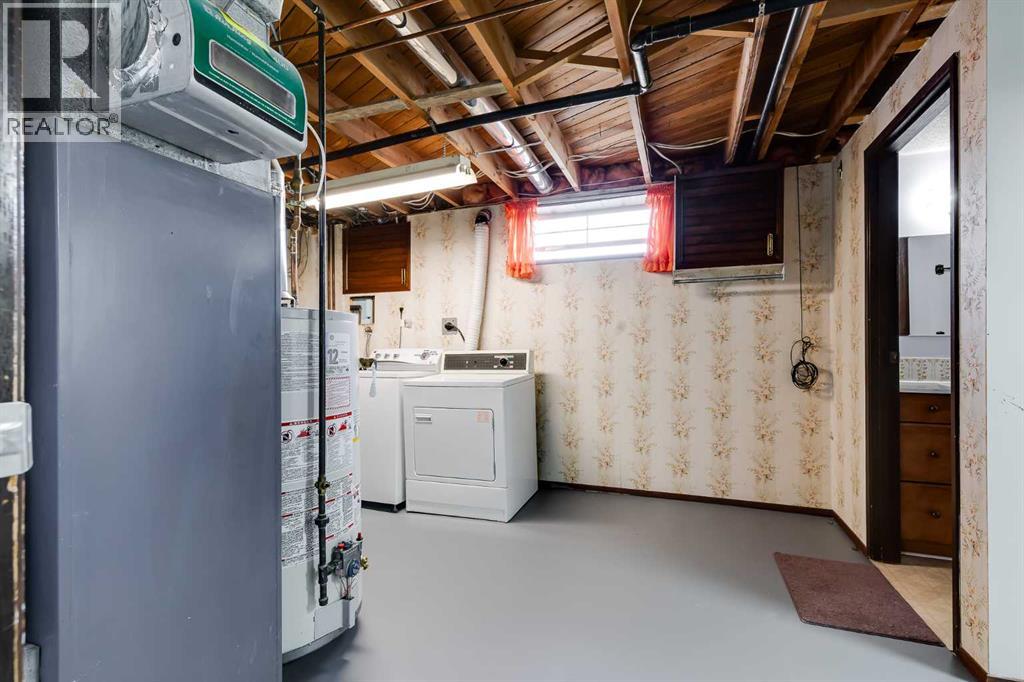 248 Huntcroft Road Ne, Calgary, Alberta  T2K 4E2 - Photo 23 - A2304860