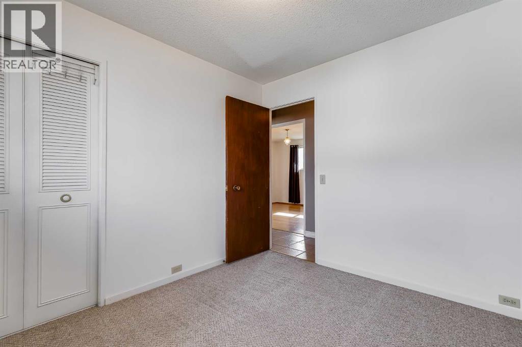 248 Huntcroft Road Ne, Calgary, Alberta  T2K 4E2 - Photo 13 - A2304860