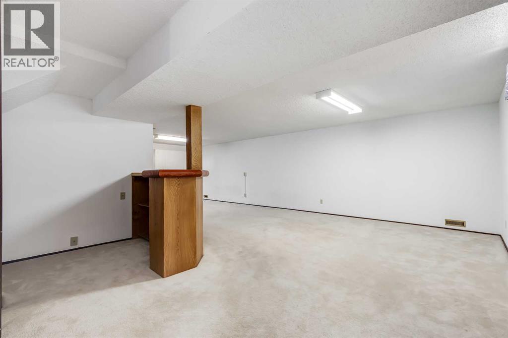 248 Huntcroft Road Ne, Calgary, Alberta  T2K 4E2 - Photo 19 - A2304860