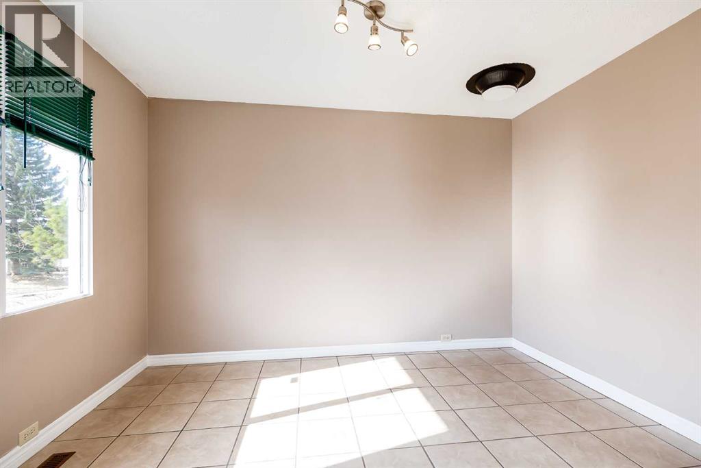 248 Huntcroft Road Ne, Calgary, Alberta  T2K 4E2 - Photo 11 - A2304860