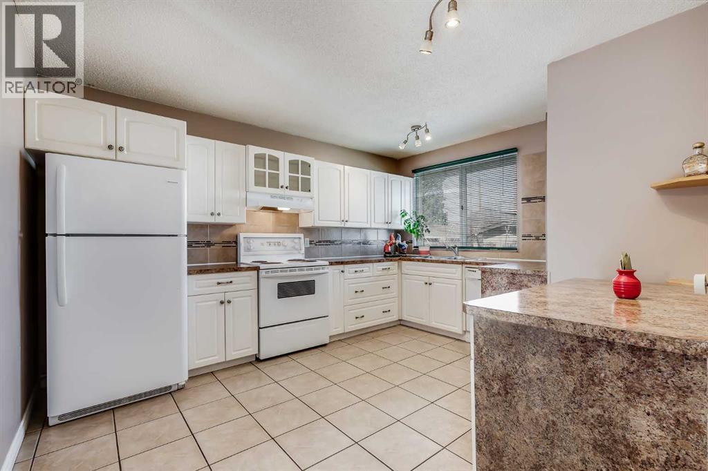 248 Huntcroft Road Ne, Calgary, Alberta  T2K 4E2 - Photo 7 - A2304860