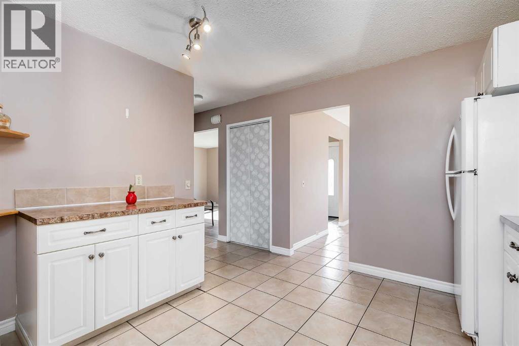 248 Huntcroft Road Ne, Calgary, Alberta  T2K 4E2 - Photo 9 - A2304860