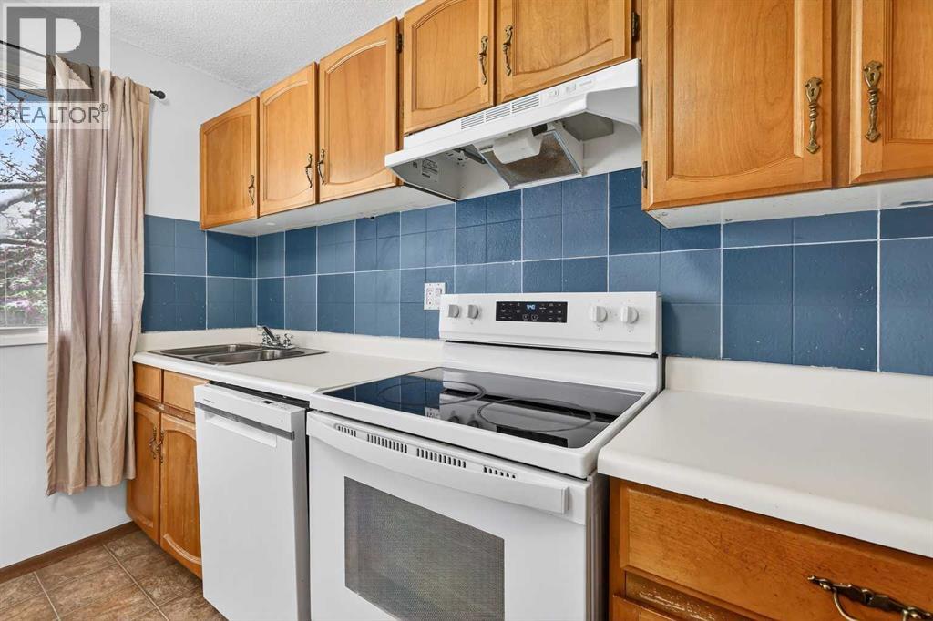 1502 Ranchlands Way Nw, Calgary, Alberta  T3G 1R2 - Photo 6 - A2296554