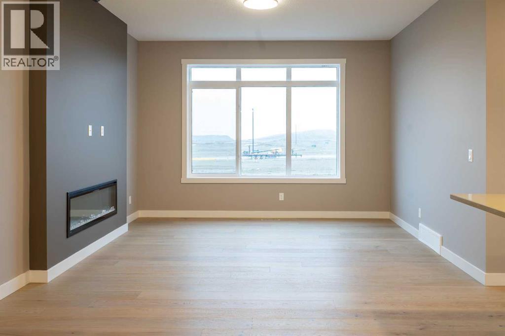 37 Southborough Lane, Cochrane, Alberta  T4C 2S6 - Photo 6 - A2287846