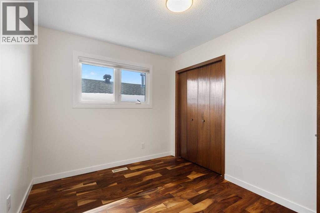 108   Woodmont Drive SW, Calgary, Alberta  T2W 4M3 - Photo 24 - A2303386