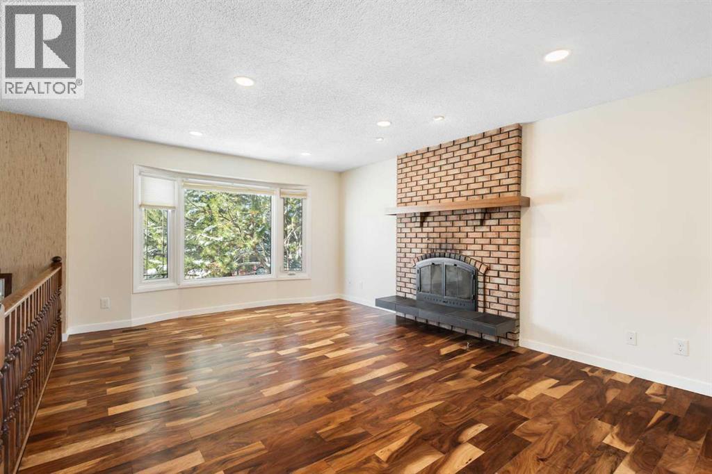 108   Woodmont Drive SW, Calgary, Alberta  T2W 4M3 - Photo 6 - A2303386