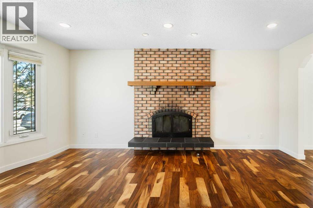 108   Woodmont Drive SW, Calgary, Alberta  T2W 4M3 - Photo 8 - A2303386