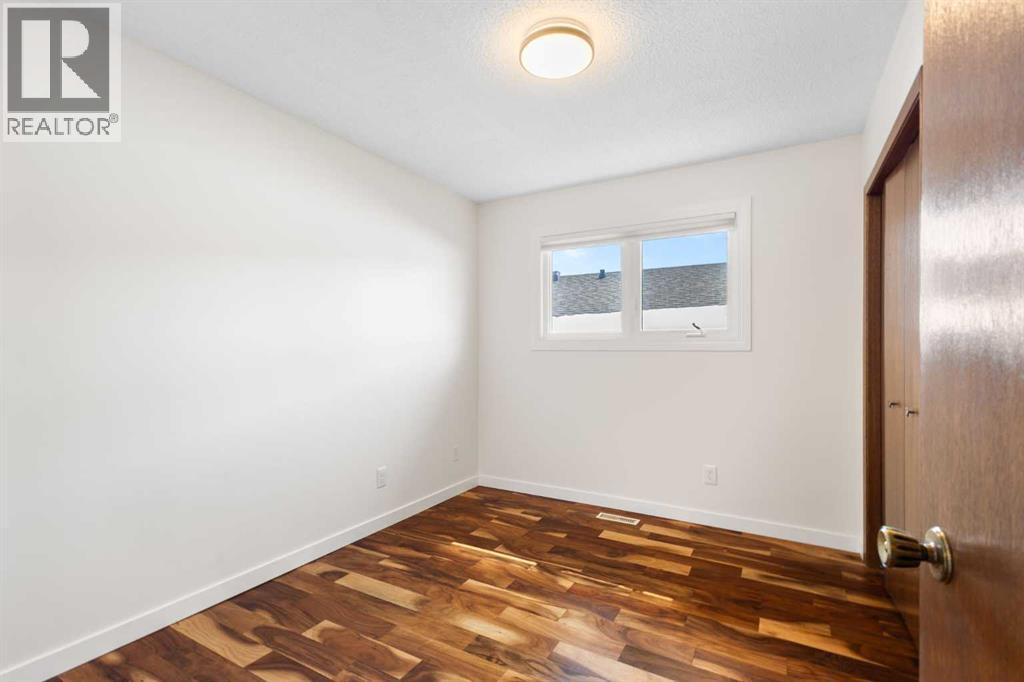 108   Woodmont Drive SW, Calgary, Alberta  T2W 4M3 - Photo 25 - A2303386