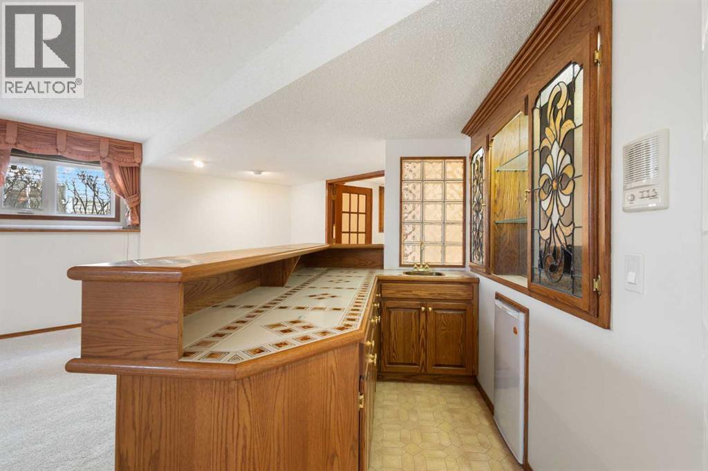 108   Woodmont Drive SW, Calgary, Alberta  T2W 4M3 - Photo 29 - A2303386