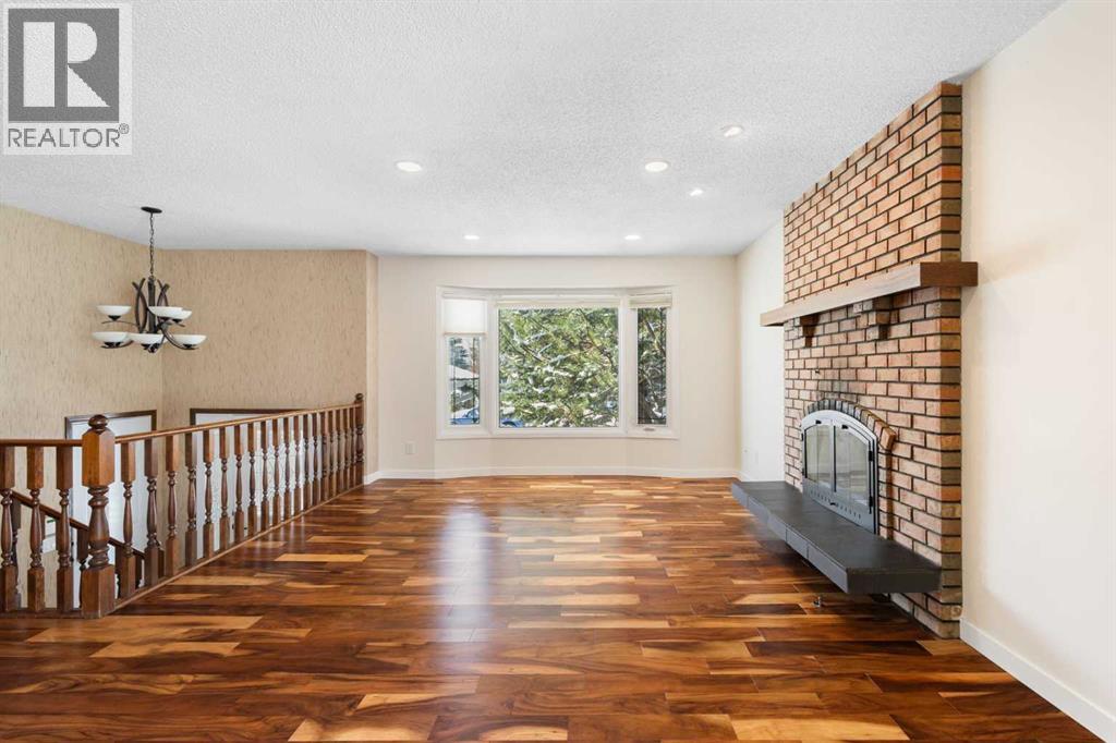 108   Woodmont Drive SW, Calgary, Alberta  T2W 4M3 - Photo 7 - A2303386