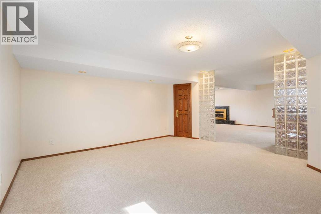 108   Woodmont Drive SW, Calgary, Alberta  T2W 4M3 - Photo 32 - A2303386