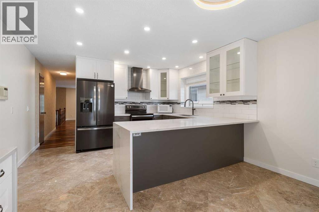 108   Woodmont Drive SW, Calgary, Alberta  T2W 4M3 - Photo 12 - A2303386