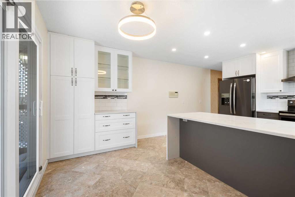 108   Woodmont Drive SW, Calgary, Alberta  T2W 4M3 - Photo 13 - A2303386