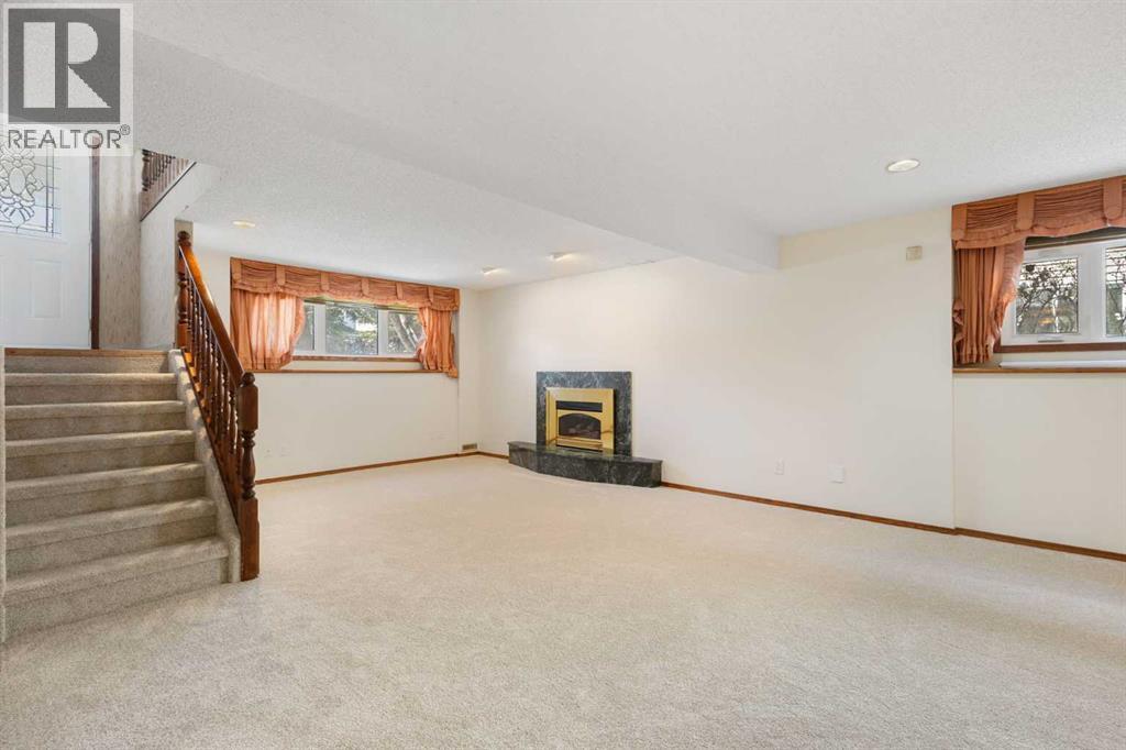 108   Woodmont Drive SW, Calgary, Alberta  T2W 4M3 - Photo 31 - A2303386