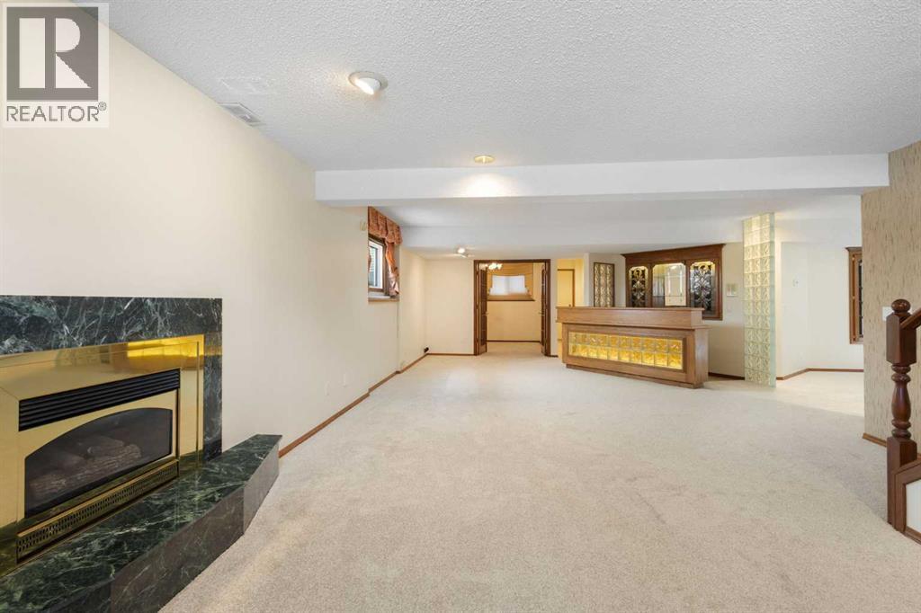 108   Woodmont Drive SW, Calgary, Alberta  T2W 4M3 - Photo 27 - A2303386