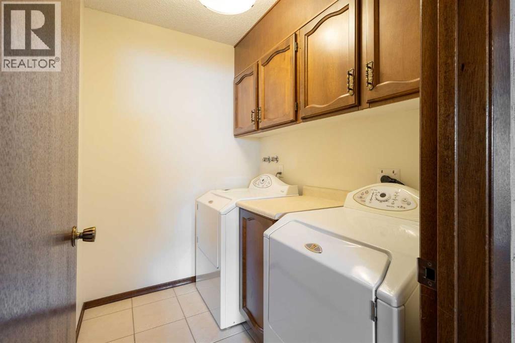 108   Woodmont Drive SW, Calgary, Alberta  T2W 4M3 - Photo 17 - A2303386