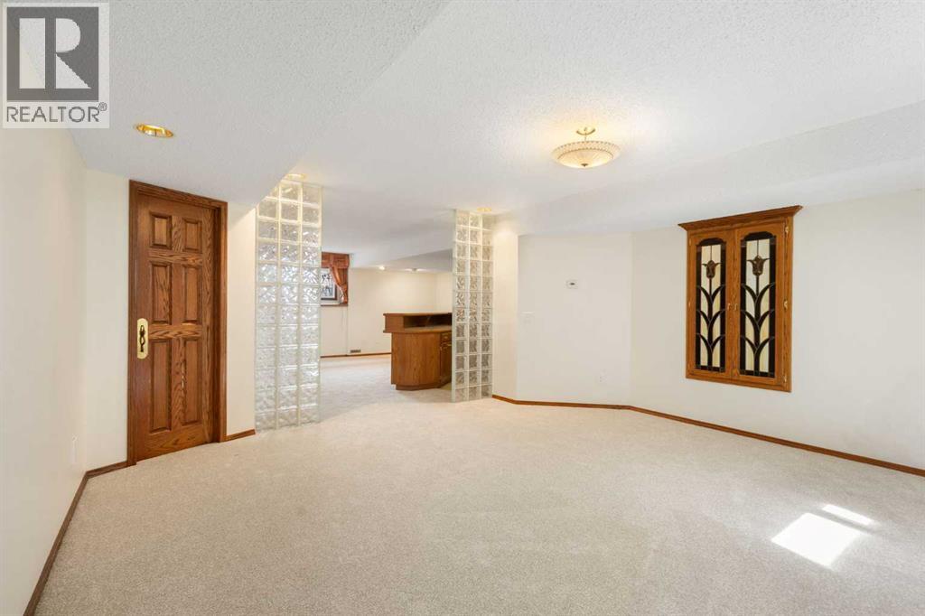 108   Woodmont Drive SW, Calgary, Alberta  T2W 4M3 - Photo 34 - A2303386