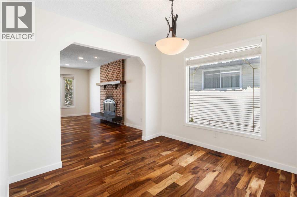 108   Woodmont Drive SW, Calgary, Alberta  T2W 4M3 - Photo 10 - A2303386