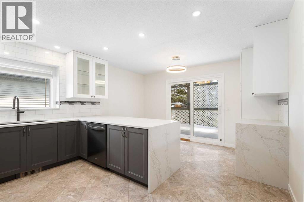 108   Woodmont Drive SW, Calgary, Alberta  T2W 4M3 - Photo 16 - A2303386