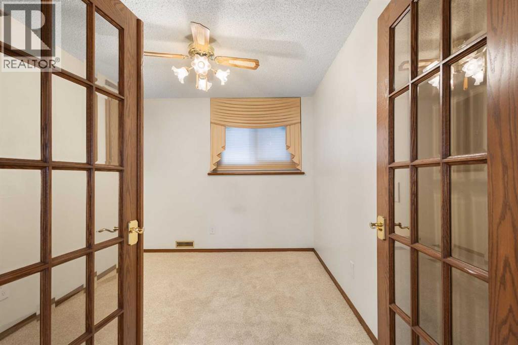 108   Woodmont Drive SW, Calgary, Alberta  T2W 4M3 - Photo 30 - A2303386