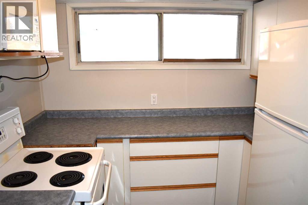 6348 Bowmont Crescent Nw, Calgary, Alberta  T3B 2H4 - Photo 26 - A2301029