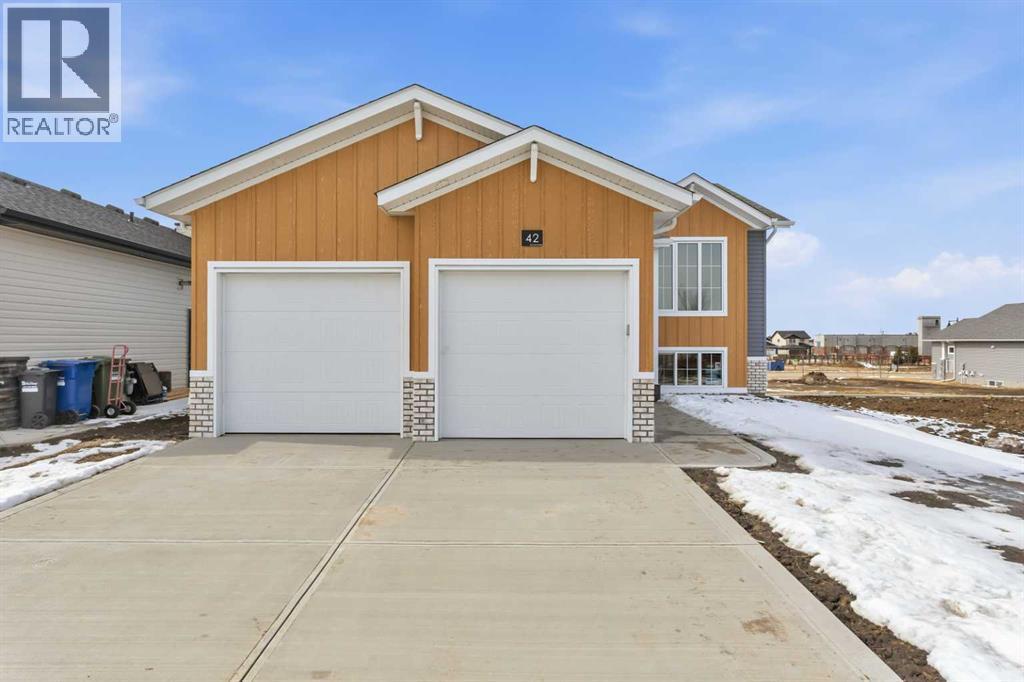 42 Tarzwell Avenue, Red Deer, Alberta  T4P 0Y9 - Photo 1 - A2276060