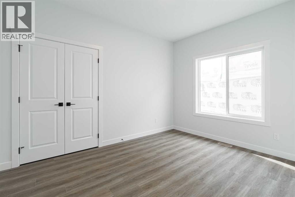 125 Monarch Bend, Rural Rocky View County, Alberta  T3Z 0K4 - Photo 19 - A2302248